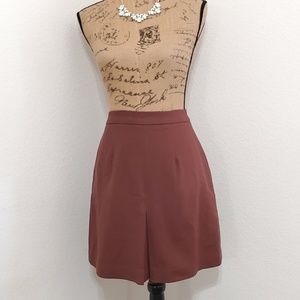 Chocolate Brown lined skirt  2 pleats hidden zipper size 4 100% wool